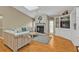 Cozy living room with stone fireplace, built-in shelving, and natural light at 18536 Alphonse Cir, Port Charlotte, FL 33948