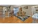 Open living space with kitchen, dining area, and comfortable seating near pool access at 18536 Alphonse Cir, Port Charlotte, FL 33948