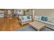 Open living space with a living room and view to kitchen and dining area at 18536 Alphonse Cir, Port Charlotte, FL 33948