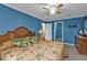 Main bedroom features a ceiling fan and easy access to a closet and bathroom at 18536 Alphonse Cir, Port Charlotte, FL 33948