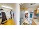 Functional bathroom with a walk-in closet, shower, vanity, and adjacent laundry area at 19170 Aviation Ct, Port Charlotte, FL 33948
