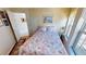 Comfortable bedroom with a window view and decorative rug at 19170 Aviation Ct, Port Charlotte, FL 33948