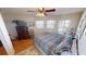 Comfortable bedroom with a ceiling fan and beautiful natural light at 19170 Aviation Ct, Port Charlotte, FL 33948