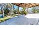 Private outdoor space with tropical foliage and a partial view of the canal at 19170 Aviation Ct, Port Charlotte, FL 33948
