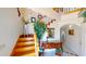 A staircase with wooden steps, a white railing, and decorative accents at 19170 Aviation Ct, Port Charlotte, FL 33948