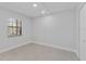 Bedroom with a closet and a window overlooking the outdoors at 19505 Quesada Ave # Ss102, Port Charlotte, FL 33948