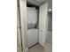 Closet featuring a stacked washer and dryer unit in a bright, clean space at 19505 Quesada Ave # Ss102, Port Charlotte, FL 33948