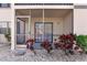 Screened patio with privacy and views of manicured landscaping at 19505 Quesada Ave # Ss102, Port Charlotte, FL 33948