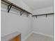 Spacious walk-in closet with custom shelves and ample storage space at 19505 Quesada Ave # Ss102, Port Charlotte, FL 33948