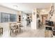 Inviting dining area adjacent to the kitchen, featuring wood-look floors and natural light at 2040 Willow Hammock Cir # 208, Punta Gorda, FL 33983