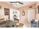 Inviting home office featuring a ceiling fan, a large desk, neutral wall color, and a printer on a stand at 2040 Willow Hammock Cir # 208, Punta Gorda, FL 33983