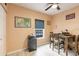 Bright home office with a window, laminate floors, and classic furniture for a professional workspace at 2040 Willow Hammock Cir # 208, Punta Gorda, FL 33983