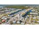 Scenic aerial view of a neighborhood featuring waterfront properties, intersecting canals, and easy boating access at 21184 Edgewater Dr, Port Charlotte, FL 33952