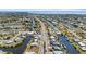 Wide shot of a waterfront community with home indicated by a location marker at 21184 Edgewater Dr, Port Charlotte, FL 33952