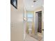Bathroom featuring toilet and walk in shower with decorative shower curtain at 21184 Edgewater Dr, Port Charlotte, FL 33952