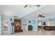 Inviting living room with tile flooring, an entertainment area, and seamless flow to other rooms at 21184 Edgewater Dr, Port Charlotte, FL 33952