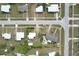 The aerial shot reveals the property within a tranquil neighborhood setting, emphasizing the surrounding landscape at 21422 Mallory Ave, Port Charlotte, FL 33952
