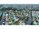 A stunning aerial view showcases the home's prime location on the canal at 240 Riviera Ct, Punta Gorda, FL 33950
