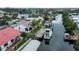 Waterfront home boasts private dock with boat, canal access, and lush landscaping in a serene neighborhood at 240 Riviera Ct, Punta Gorda, FL 33950