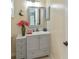Updated bathroom featuring modern vanity with drawers and cabinets and bright natural light at 240 Riviera Ct, Punta Gorda, FL 33950
