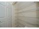 Well-organized storage space with multiple wire shelves for optimal organization at 240 Riviera Ct, Punta Gorda, FL 33950