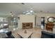 Spacious living room with bright lighting, sleek furniture, and a modern aesthetic at 240 Riviera Ct, Punta Gorda, FL 33950