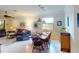 Inviting dining and living areas offer generous seating, creating an ideal space for Gathering gatherings and entertaining at 2419 Daisy Dr, North Port, FL 34289