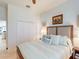 Bedroom with a bed, white walls, and double closets at 24313 Westgate Blvd, Punta Gorda, FL 33980