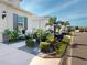 Beautifully landscaped front yard with lush greenery and a charming mailbox that enhances curb appeal at 24313 Westgate Blvd, Punta Gorda, FL 33980