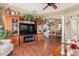 Spacious living room featuring a built-in entertainment center and access to the dining area at 26373 Madagascar, Punta Gorda, FL 33983