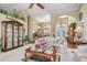 Comfortable living room with a large window, archways, and a view leading to the dining area at 26373 Madagascar, Punta Gorda, FL 33983