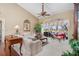 Bright and airy living room with high ceilings, large windows overlooking the water, and stylish furnishings at 26373 Madagascar, Punta Gorda, FL 33983