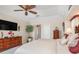 This main bedroom is traditionally decorated with a lovely color palette, a tv, and spacious layout at 26373 Madagascar, Punta Gorda, FL 33983