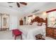 This main bedroom is traditionally decorated with a lovely color palette and a spacious layout at 26373 Madagascar, Punta Gorda, FL 33983