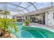 Backyard showing covered pool and patio, perfect for outdoor entertaining and relaxation at 26373 Madagascar, Punta Gorda, FL 33983