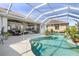 Inviting screened pool with easy access to the patio and home at 26373 Madagascar, Punta Gorda, FL 33983