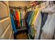 Walk-in closet with wire shelving filled with shirts, jackets, hats, and an organized closet at 282 Shaefer St, Port Charlotte, FL 33953