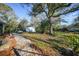 Beautiful brick path in the backyard leading to a storage shed at 2987 Lawyer Ter, North Port, FL 34288