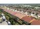 An aerial view highlights this quaint home with a screened in porch in a quiet neighborhood at 3748 Albacete Cir # 38, Punta Gorda, FL 33950