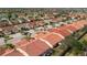 The aerial view showcases the quaint home with a golf course in a quiet neighborhood at 3748 Albacete Cir # 38, Punta Gorda, FL 33950
