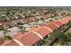 Panoramic aerial view showcasing a vibrant residential neighborhood near green golf course fairways and lakes at 3748 Albacete Cir # 38, Punta Gorda, FL 33950