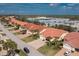 An aerial view shows the quaint home with an appealing landscape in a quiet neighborhood at 3748 Albacete Cir # 38, Punta Gorda, FL 33950