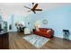 Spacious living room with vaulted ceilings, ceiling fan, and views of the kitchen and dining area at 3748 Albacete Cir # 38, Punta Gorda, FL 33950