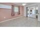 Bedroom with tile flooring and sliding doors leading to outdoor lanai at 429 Dorchester St, Port Charlotte, FL 33954