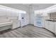 Modern kitchen featuring white cabinets, stainless steel appliances, and a stylish backsplash at 429 Dorchester St, Port Charlotte, FL 33954