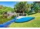 Waterfront view featuring a canoe and dock at 429 Dorchester St, Port Charlotte, FL 33954