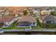 Home with a private dock, screened pool, and well-maintained lawn in a waterfront community at 4320 Vasco St, Punta Gorda, FL 33950