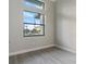 Bedroom with large windows offering a bright and airy atmosphere at 4320 Vasco St, Punta Gorda, FL 33950
