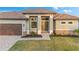 Close up of the main entrance showing the beautiful front door at 4320 Vasco St, Punta Gorda, FL 33950