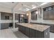 Kitchen boasts granite counters, stainless appliances, a wine cooler, and stylish wood cabinets at 4320 Vasco St, Punta Gorda, FL 33950